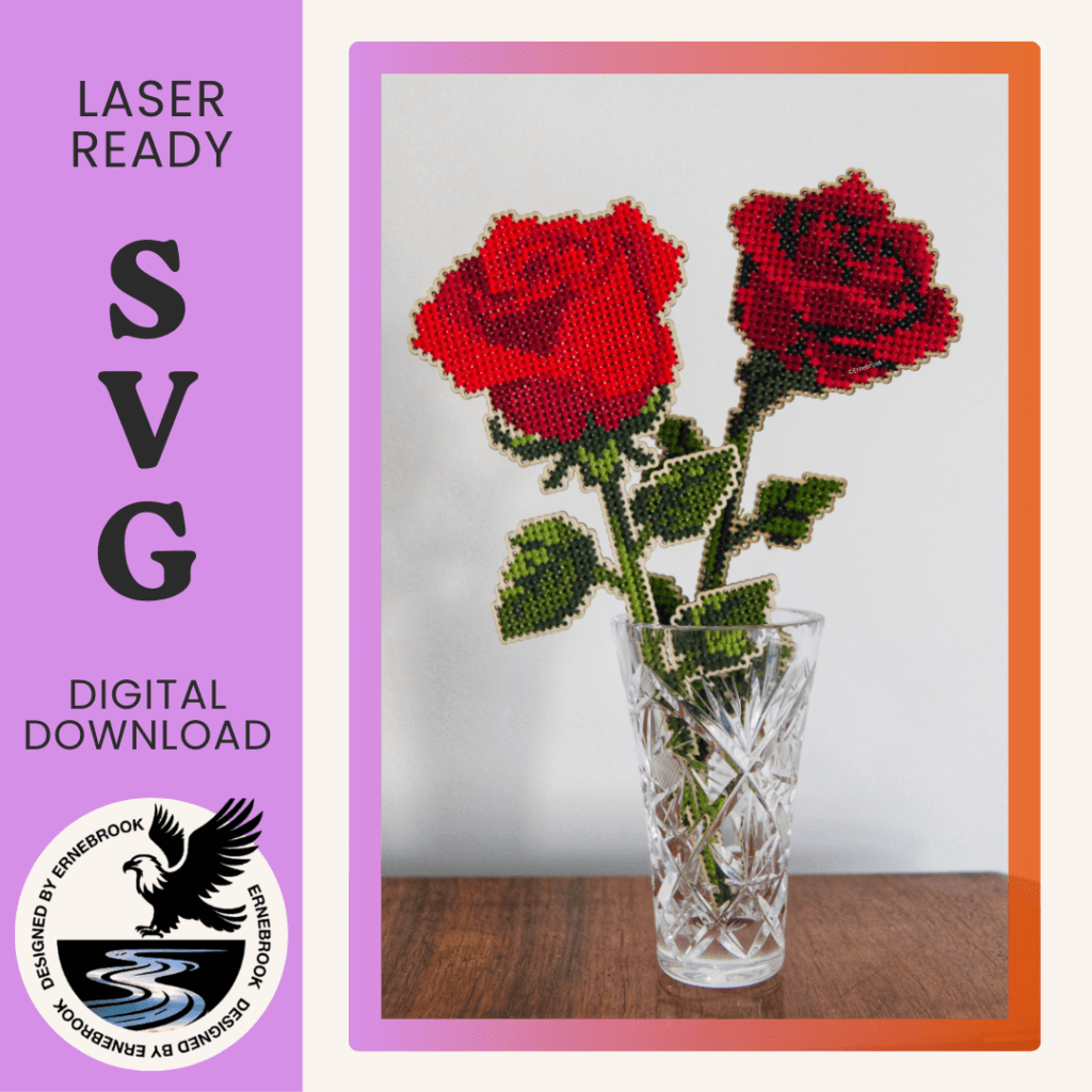 Image of two red rose templates in wood and completed with cross stitch embroidery in a small glass vase.