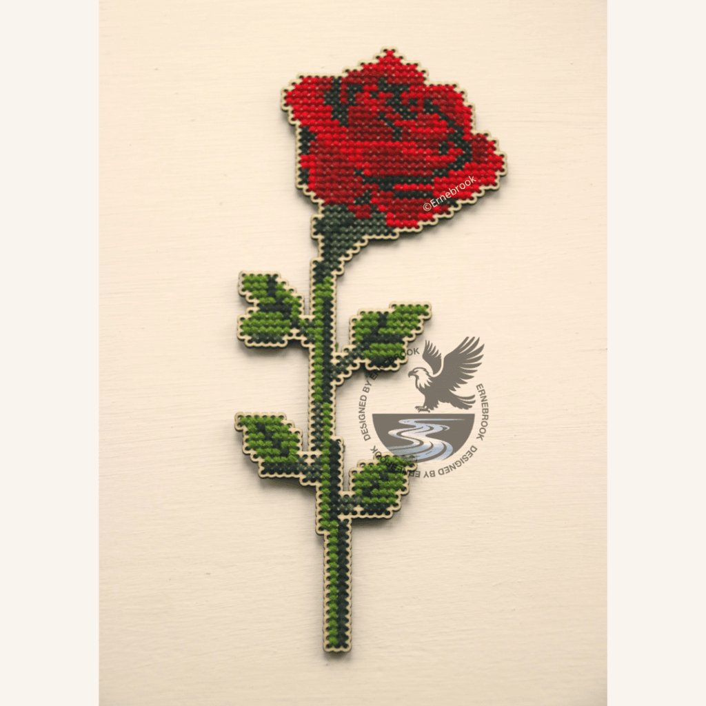 An elegant cross-stitch home decoration. Cut out of 3mm plywood with a cross-stitch design embroidered.