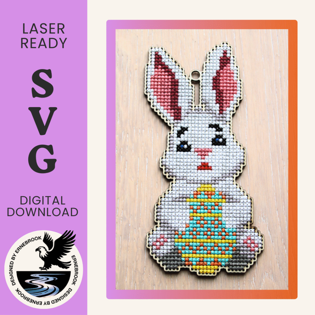 Image of an Easter Bunny holding and colourfully decorated egg template, laser cut in wood and completed with cross stitch embroidery. To the left is a purple panel with the words Laser ready SVG digital download with the logo of Ernebrook Designs of an Eagle flying above a brook.